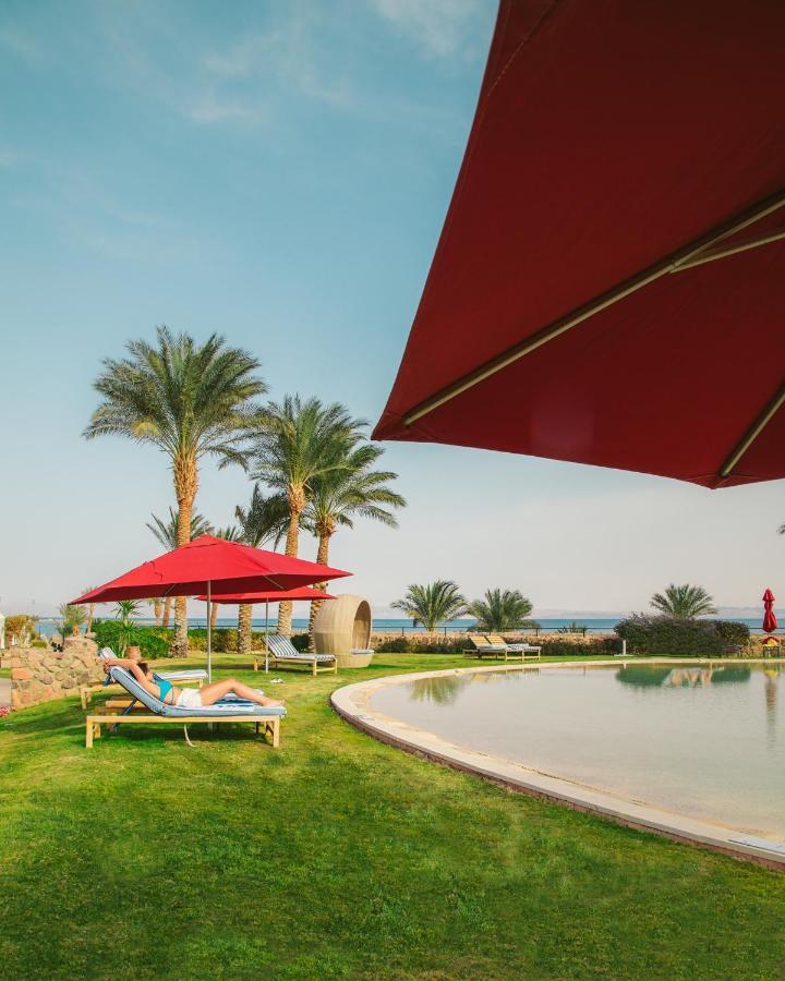 Retac Qunay Dahab Resort & Spa Bagian luar foto Pool at the Hilton Taba